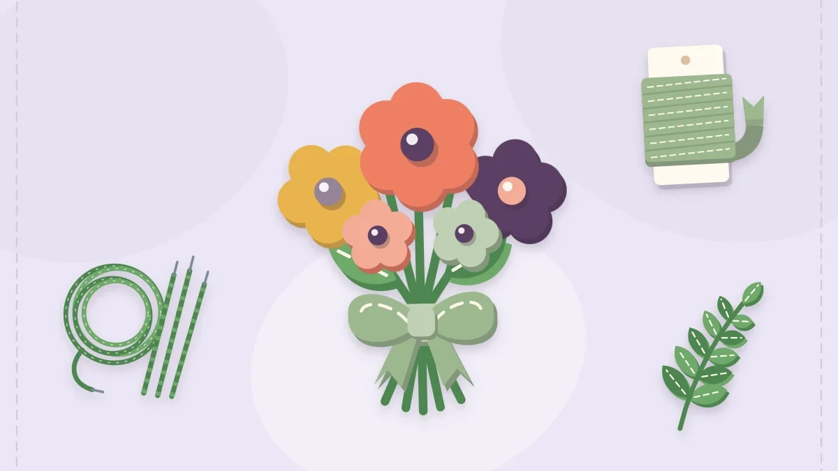 A tied felt flower bouquet with ribbon, a leaf sprig and floral wire